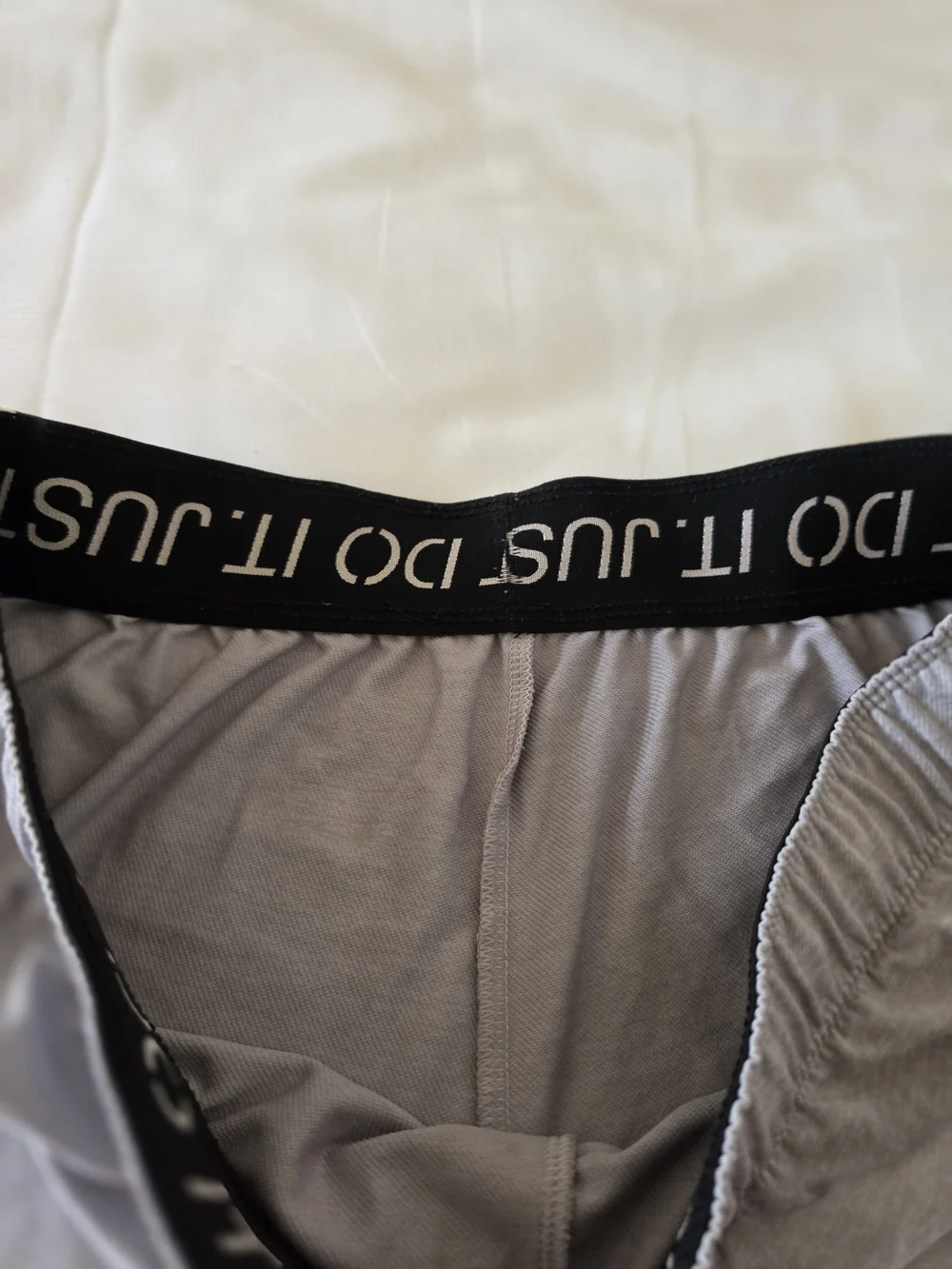 Nike Gray Women's Athletic Shorts with 'Just Do It' Trim